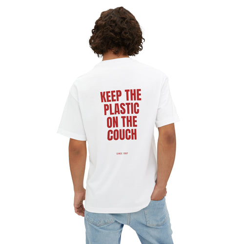 Person wearing the Keep the Plastic on the Couch oversized tee, back view