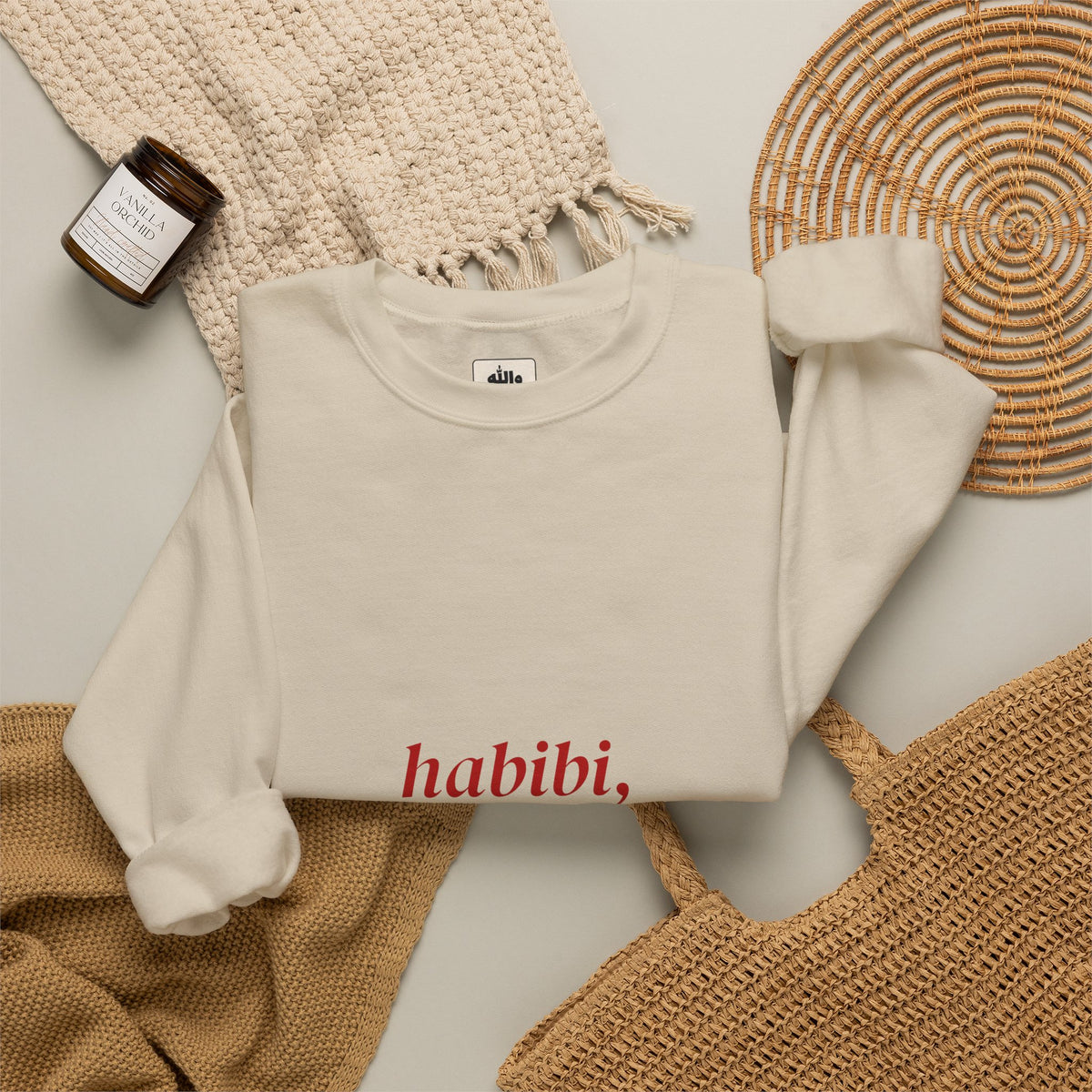 Person wearing the Habibi, It's Complicated crewneck sweatshirt, standing