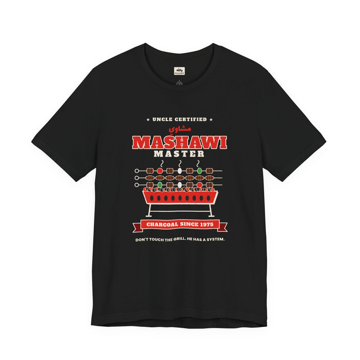 Mashawi Master tee with kebab skewers on a charcoal grill, uncle certified
