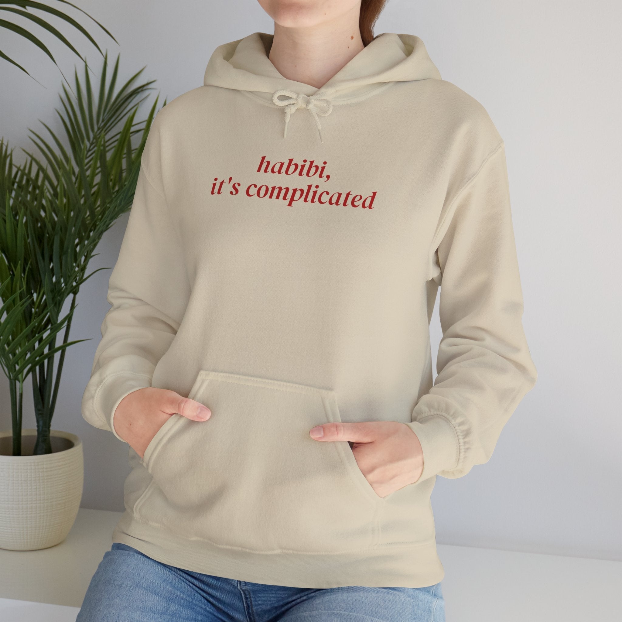 Model wearing the Habibi, It's Complicated hoodie in sand